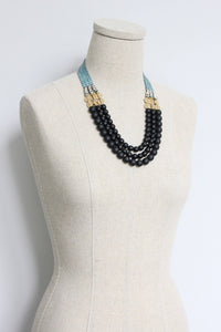 Jet glass and hematite triple strand necklace