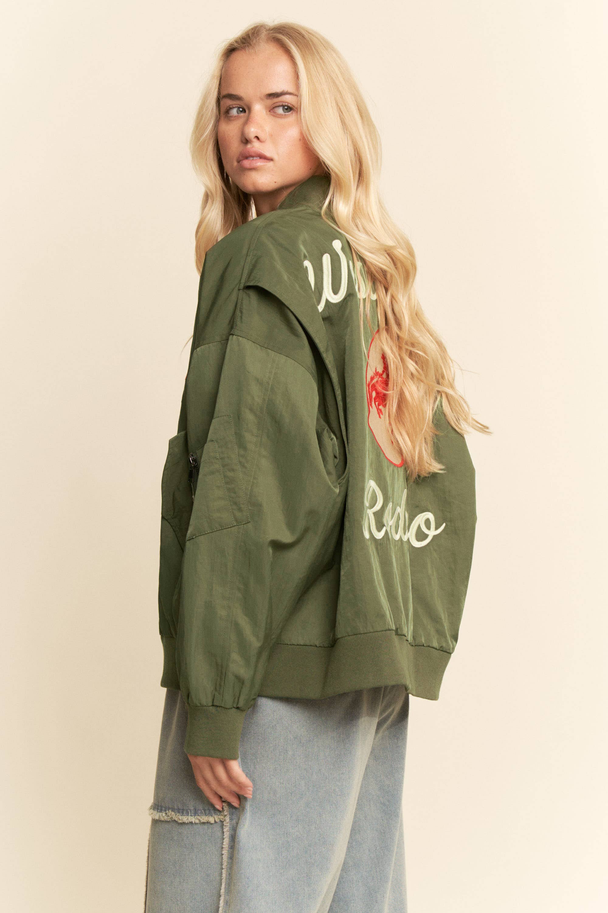 WEST LEAGUE VARSITY LOVE BOMBER