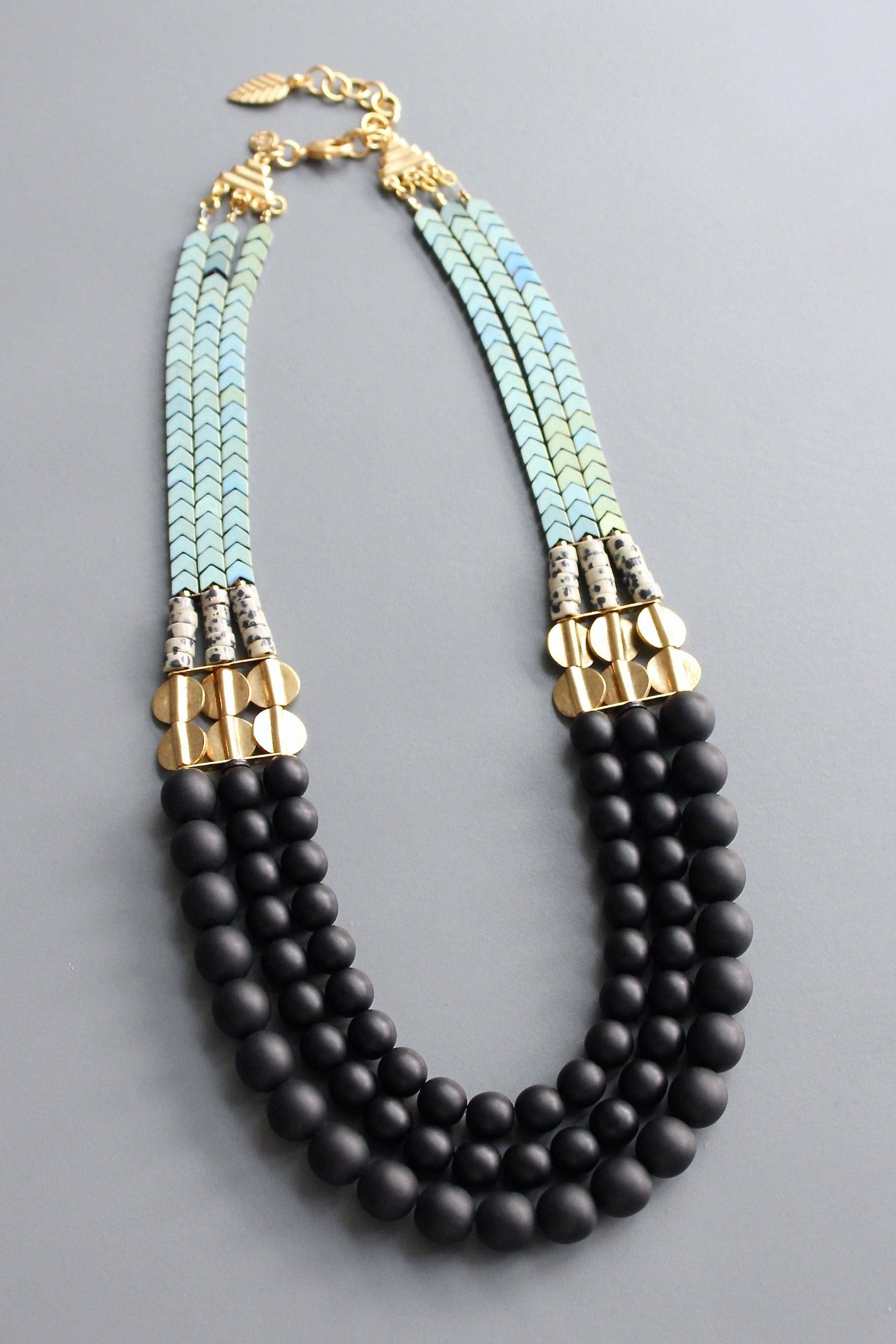 Jet glass and hematite triple strand necklace